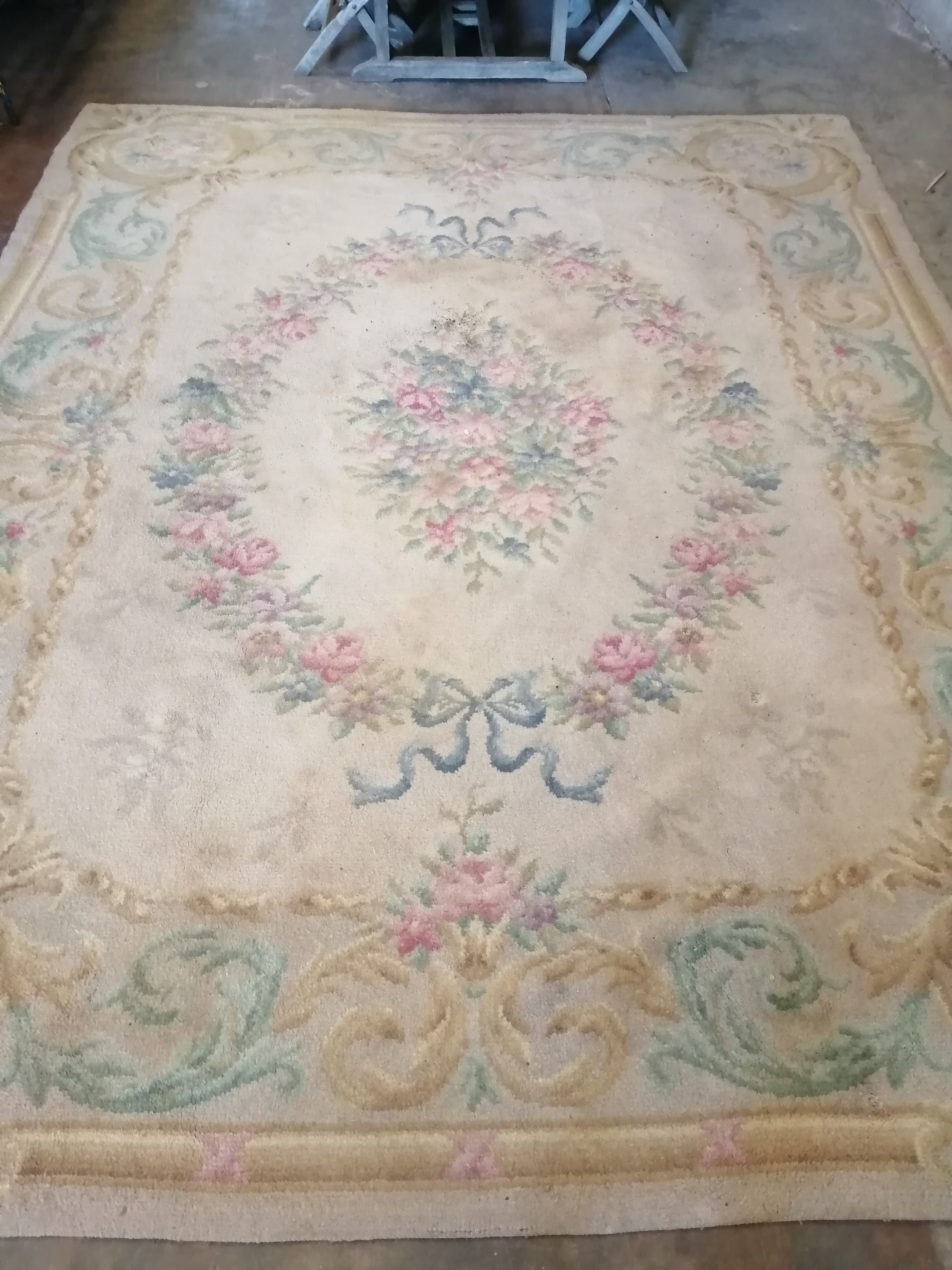 An Aubusson style fawn ground wool carpet, 360 x 260cm